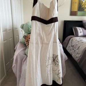 Elegant White Dress with Floral Design